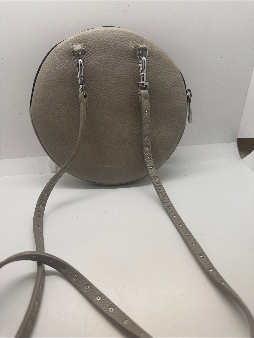 Bandolier Taupe Round Pebbled Leather Crossbody with Studded Strap